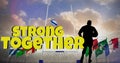 Digital composite image of strong together text with silhouette sportsman and flags against sky Royalty Free Stock Photo