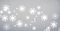 Digital composite image of white snowflakes pattern against lavender colored background