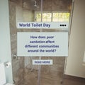Digital composite image of world toilet day text with question in bathroom, copy space