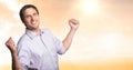 Man celebrating success in sunset Royalty Free Stock Photo