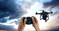 Man flying a drone silhouette in sky Royalty Free Stock Photo