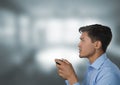 man playing with computer game controller with bright windows background Royalty Free Stock Photo