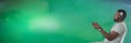 man playing with computer game controller with green fog background Royalty Free Stock Photo