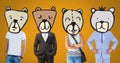 People with bear animal head faces Royalty Free Stock Photo