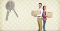 people moving boxes into new home with key Royalty Free Stock Photo