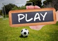 play text on blackboard with soccer field and football Royalty Free Stock Photo