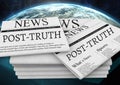 Post-truth text on newspapers stacked over planet earth world Royalty Free Stock Photo