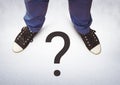 Question mark and Black shoes on feet with grey background Royalty Free Stock Photo