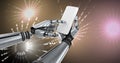 Robotic android hand using phone device and Glowing Firework circle shapes Royalty Free Stock Photo