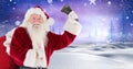 Santa with a bell in Christmas Winter landscape Royalty Free Stock Photo