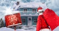 Santa Claus looking at 3d winter scenery with house Royalty Free Stock Photo