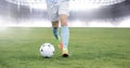 Soccer player on grass with football in stadium Royalty Free Stock Photo