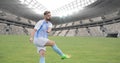 Soccer player on grass in stadium Royalty Free Stock Photo