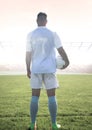 Soccer player on grass with stadium Royalty Free Stock Photo