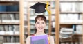 Student mature woman in education library with graduation hat