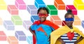 Superhero children with colorful geometric pattern