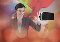 Woman touching and interacting with virtual reality headset with transition effect Royalty Free Stock Photo