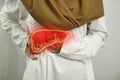 Digital composition of human liver with highlighted red inflammation on sick person, woman with stomach pain