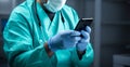 Digital connection a doctors hand in gloves skillfully operates a smartphone