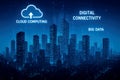 Digital connectivity concept with cloud computing and big data over a dark cityscape skyline skyscrapers Royalty Free Stock Photo