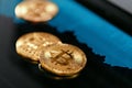 Digital Currency Bitcoin Closeup With Financial Graphics Royalty Free Stock Photo