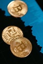 Digital Currency Bitcoin Closeup With Financial Graphics Royalty Free Stock Photo