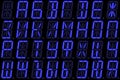 Digital Cyrillic font from capital letters on blue alphanumeric LED display