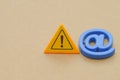 Digital Danger: Warning Symbol Intersects Internet Icon, Highlighting Email Security Threats and the Critical Need for Royalty Free Stock Photo