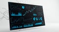 Digital dashboard displaying various charts and graphs on a dark background. The Royalty Free Stock Photo