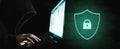 Digital data security system and protection. Anonymous hacker try to hacking on computer laptop Royalty Free Stock Photo