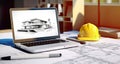 Digital design through architectural design software on laptop screen with documents and design plan on office desk - technology Royalty Free Stock Photo