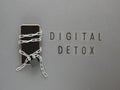 Digital detox concept with blocked smartphone and chain with lock Royalty Free Stock Photo