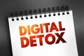 Digital Detox - period of time when a person voluntarily refrains from using digital devices, text on notepad