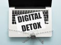 Digital detox sign over silver laptop. Blocked computer with chain and lock, flat lay Royalty Free Stock Photo