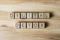 DIGITAL DETOX text on wooden cubes on wooden background