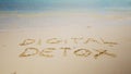 Digital Detox Word Written On Sand Near The Sea