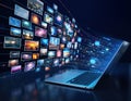 Digital display of images flowing from a laptop in a modern setting with bright visuals and data connections Royalty Free Stock Photo