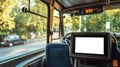 Digital Display Inside Bus Featuring Stop Announcement in Urban Setting with Natural Light