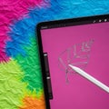 A digital drawing setup features a close-up of a tablet disp Royalty Free Stock Photo