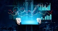 Digital Financial Analysis with Trend Graphs and Data Visualization on a Tablet in a Modern Urban Environment Scalp Royalty Free Stock Photo
