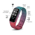 A digital fitness tracker with a colorful gradient band features a rectangular touch Royalty Free Stock Photo