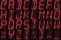 Digital font from capital letters on red alphanumeric LED display Royalty Free Stock Photo