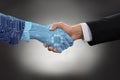 Digital Generated Human Hand And Business Man Shaking Hands Royalty Free Stock Photo