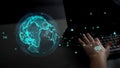 Digital Global Connectivity and Technology Integration with Hand Reaching for Interactive World Interface on Laptop Royalty Free Stock Photo