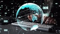Digital Globe with Data Visualization Overlaid on Keyboard and Hands, Representing Global Connectivity and Technology in Royalty Free Stock Photo