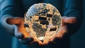 Digital globe with glowing connections held in hands representing global technology Royalty Free Stock Photo
