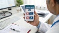 Digital health platform displaying treatment plans on smartphone, emphasizing secure messaging and privacy settings for effective Royalty Free Stock Photo