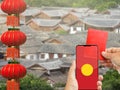 The digital hongbao on cell phone in chinese lunar new year Royalty Free Stock Photo