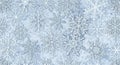A digital illustration featuring a pattern of intricate snowflakes on a textured blue background. Royalty Free Stock Photo