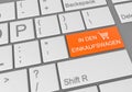 Digital illustration of keyboard with an orange adding to cart button in german for online shopping Royalty Free Stock Photo